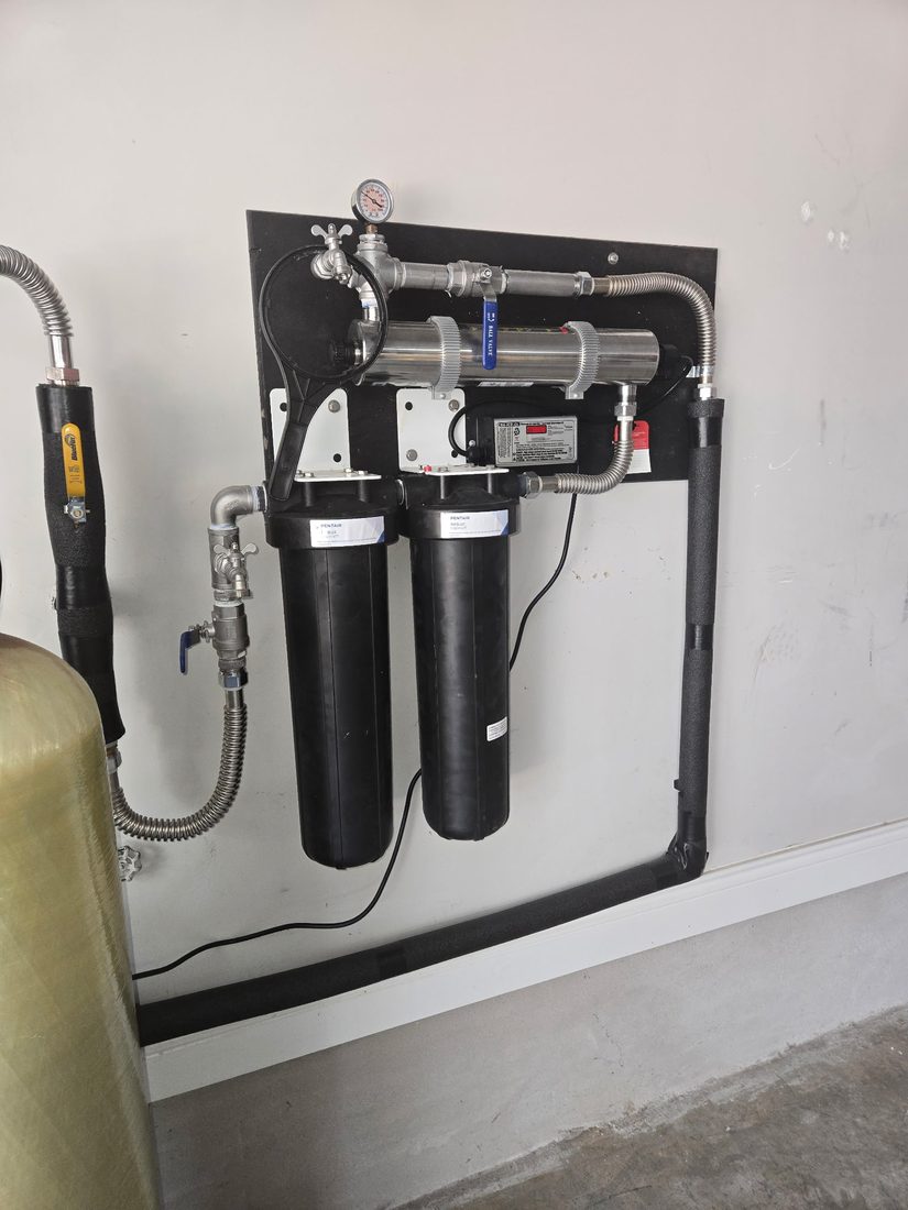 Wall-mounted whole-house multi-stage water filtration system