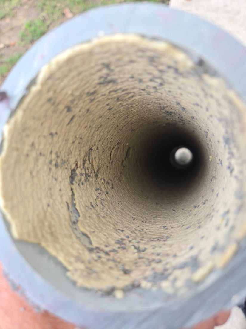 Commercial pipe choked down by hard scale